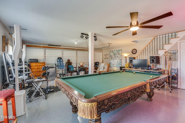 playroom with a ceiling fan, pool table, a garage, and speckled floor