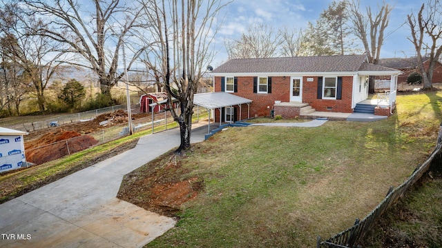 single story home featuring brick siding, crawl space, fence, driveway, and a front lawn