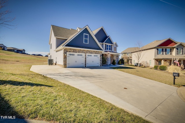 view of front facade featuring cooling unit, a garage, concrete driveway, a front lawn, and board and batten siding