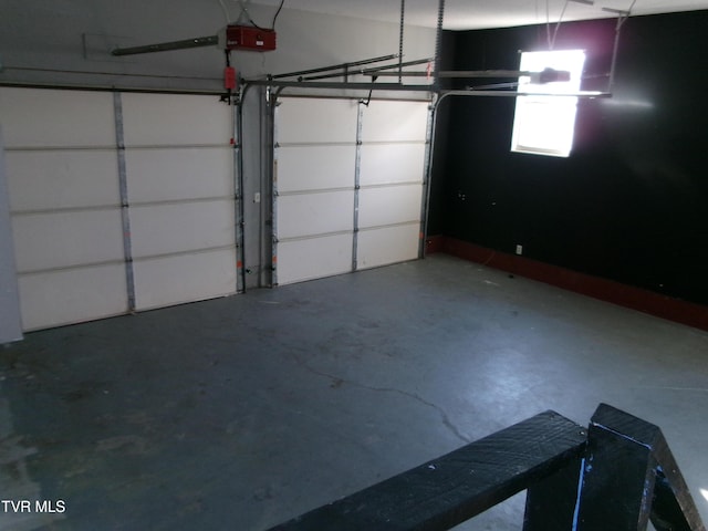 garage featuring a garage door opener