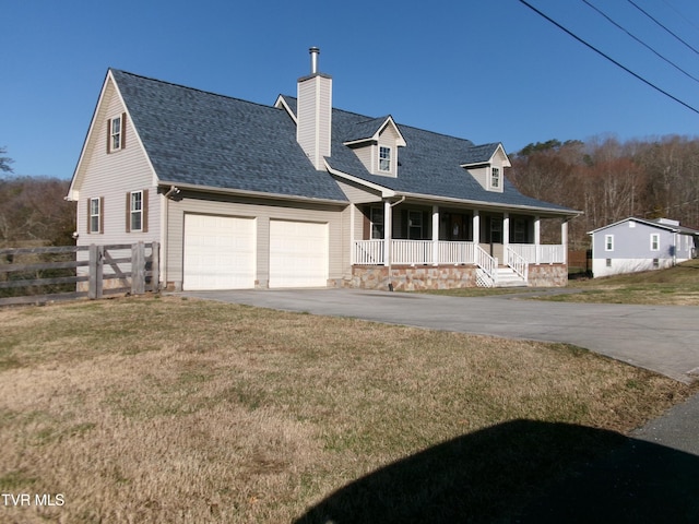 cape cod home featuring a porch, a garage, fence, driveway, and a front lawn