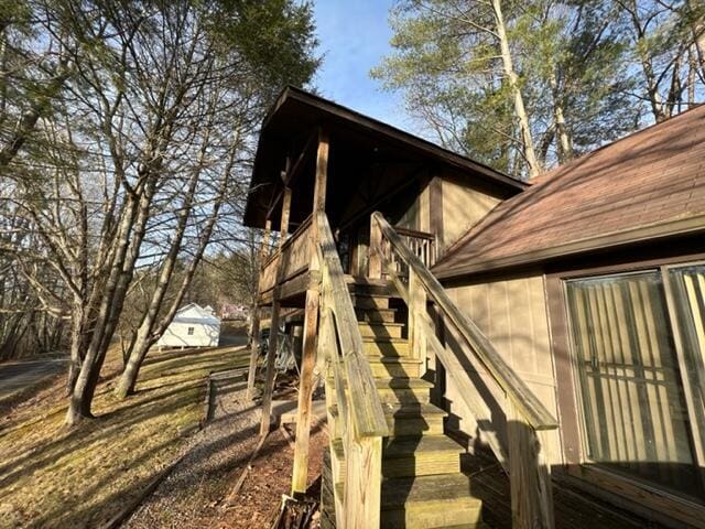 view of home's exterior with stairs