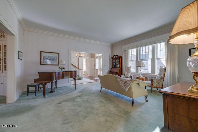 living area with a chandelier, carpet floors, and ornamental molding