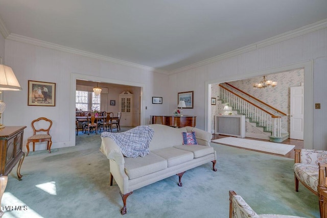 living room with stairway, a chandelier, carpet flooring, and ornamental molding