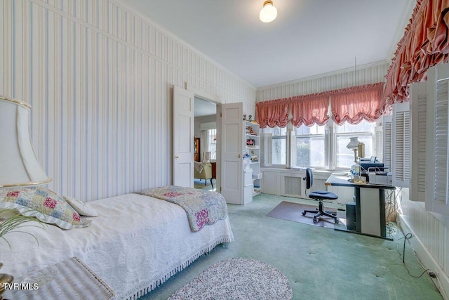 carpeted bedroom with ornamental molding