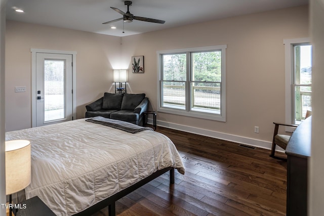 bedroom with dark wood-style flooring, recessed lighting, visible vents, ceiling fan, and baseboards