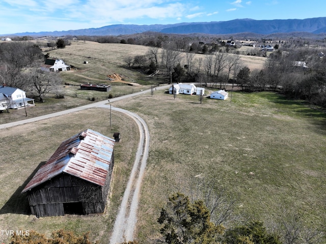 bird's eye view featuring a mountain view and a rural view