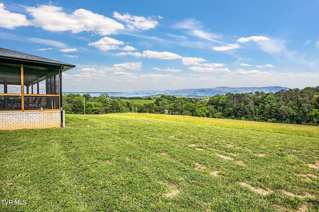 2150 Sunnyside Rd, Greeneville, TN 37743 - view of green lawn with a sunroom and a mountain view