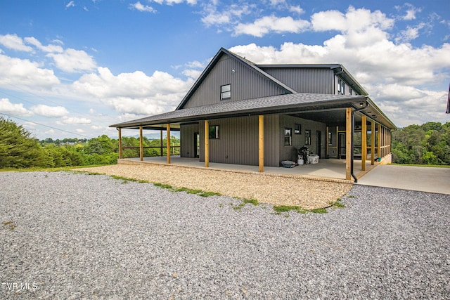 2150 Sunnyside Rd, Greeneville, TN 37743 - view of home's exterior with a patio and roof with shingles