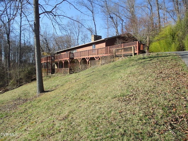 view of yard featuring a deck