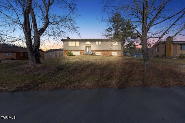 view of front of house featuring brick siding