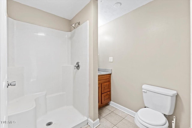 full bathroom with toilet, baseboards, walk in shower, and tile patterned floors