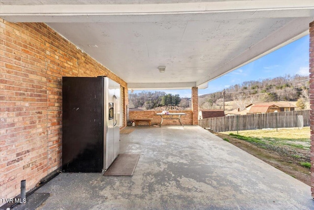 view of patio with fence