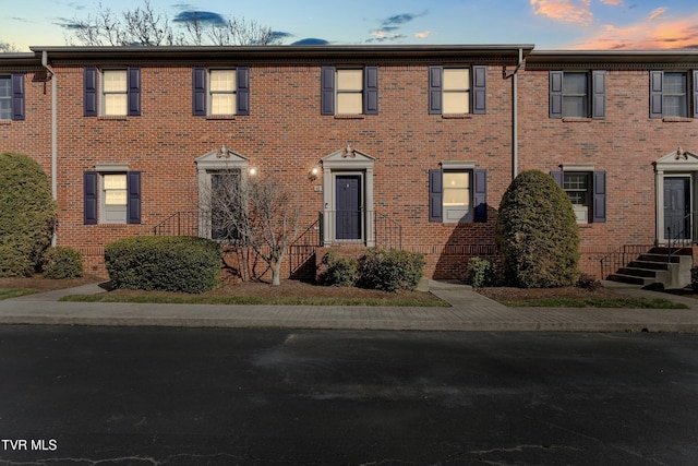 view of front of property with brick siding