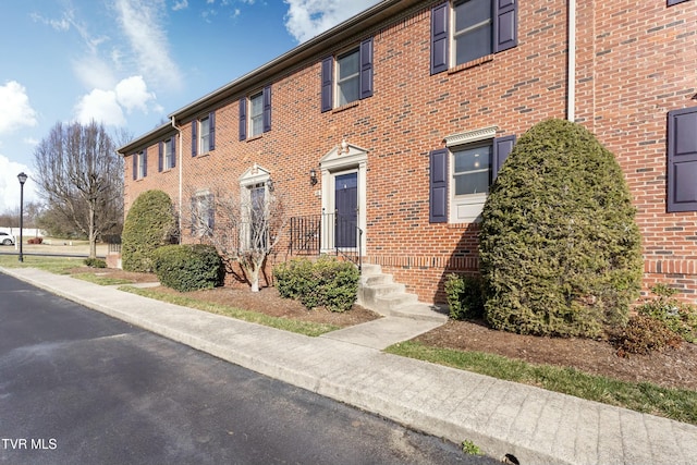 multi unit property featuring brick siding