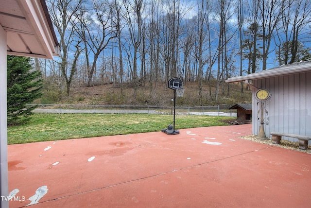 view of patio / terrace featuring fence