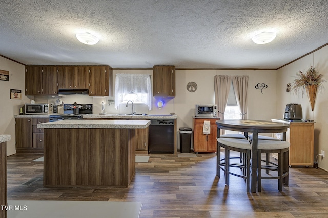 kitchen featuring dishwasher, ornamental molding, stove, and dark wood finished floors