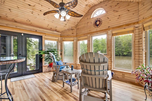 sunroom / solarium with wood ceiling and vaulted ceiling