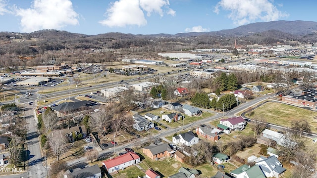 birds eye view of property with a residential view and a mountain view