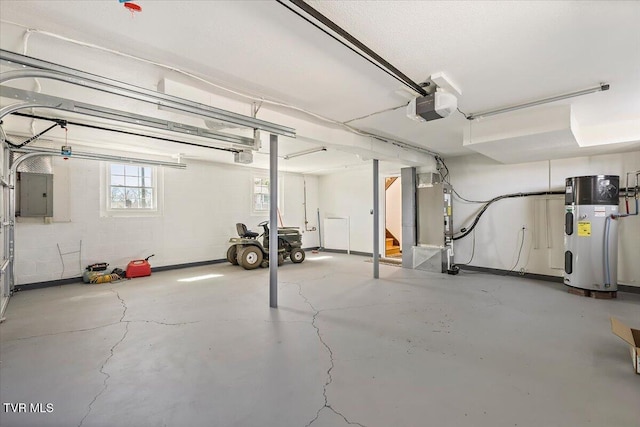 garage featuring heat pump water heater, electric panel, and a garage door opener