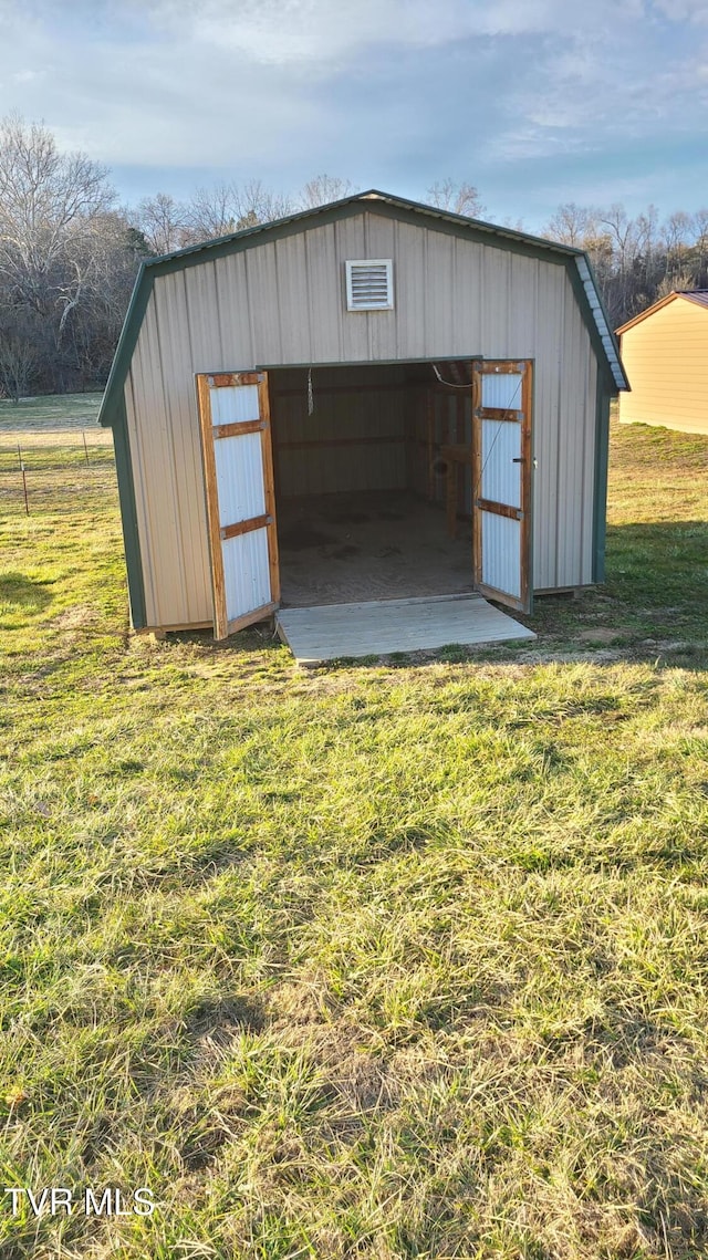 view of outbuilding with an outdoor structure