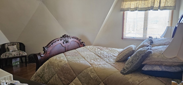 bedroom featuring wood finished floors