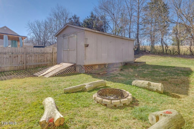 view of shed featuring fence