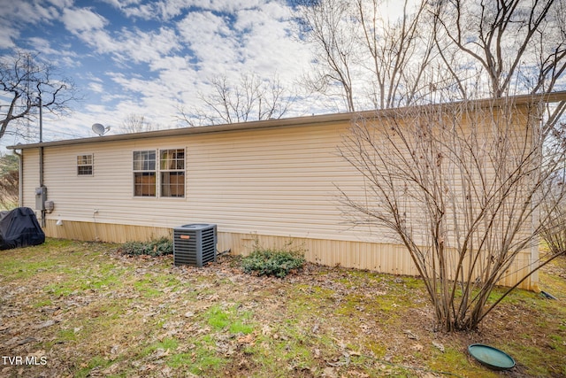 view of property exterior featuring central air condition unit