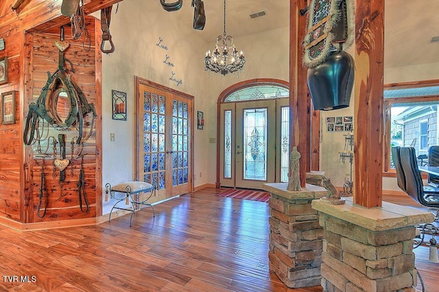 251 Fee Trl, Ewing, VA 24248 - foyer with a notable chandelier, wood finished floors, a towering ceiling, visible vents, and french doors