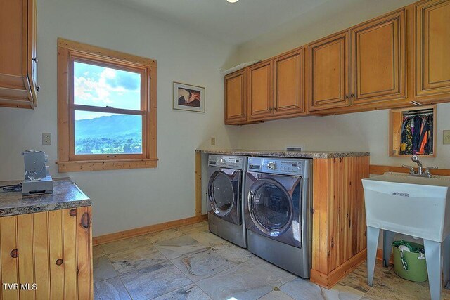 251 Fee Trl, Ewing, VA 24248 - laundry area with washing machine and clothes dryer, cabinet space, and baseboards