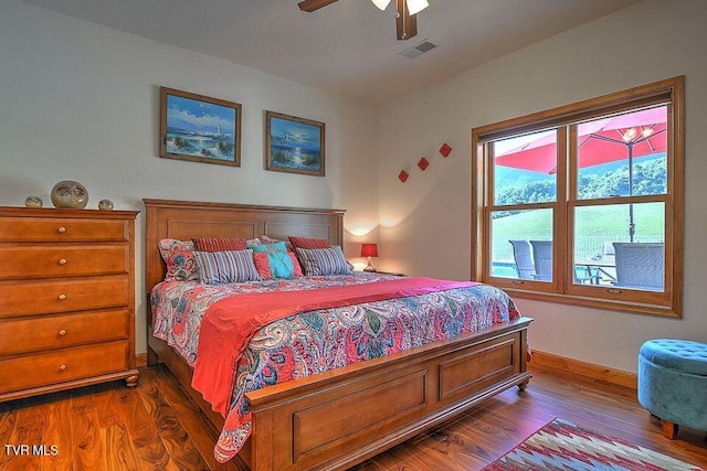 251 Fee Trl, Ewing, VA 24248 - bedroom featuring dark wood-type flooring, a ceiling fan, visible vents, and baseboards