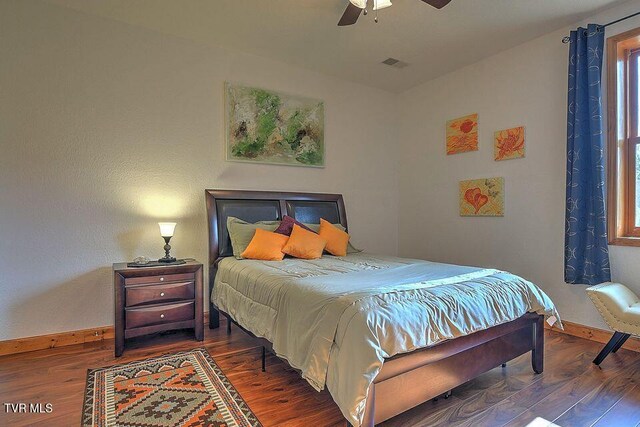 251 Fee Trl, Ewing, VA 24248 - bedroom featuring visible vents, baseboards, and wood finished floors