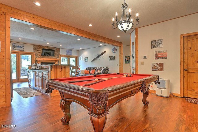251 Fee Trl, Ewing, VA 24248 - playroom with a textured ceiling, recessed lighting, wood finished floors, french doors, and beam ceiling
