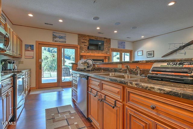 251 Fee Trl, Ewing, VA 24248 - kitchen with appliances with stainless steel finishes, french doors, a sink, and hardwood / wood-style floors