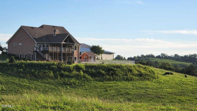 251 Fee Trl, Ewing, VA 24248 - back of property featuring a chimney, stairway, and a deck