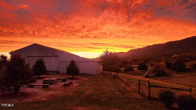 251 Fee Trl, Ewing, VA 24248 - view of yard with fence, a pole building, a mountain view, and an outbuilding