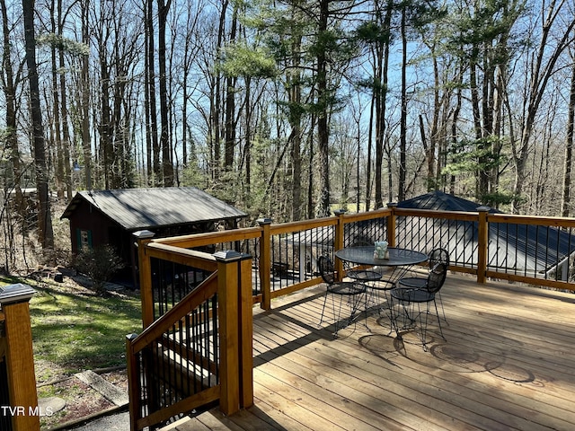 deck featuring an outdoor structure