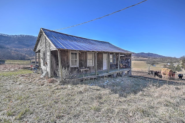 view of outdoor structure with a mountain view