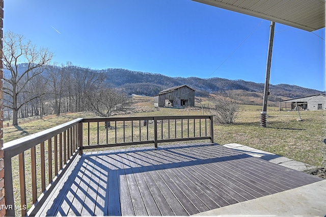 wooden terrace with a mountain view