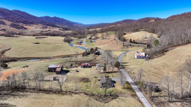 aerial view featuring a rural view and a mountain view