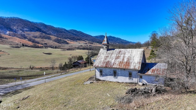 drone / aerial view with a rural view and a mountain view