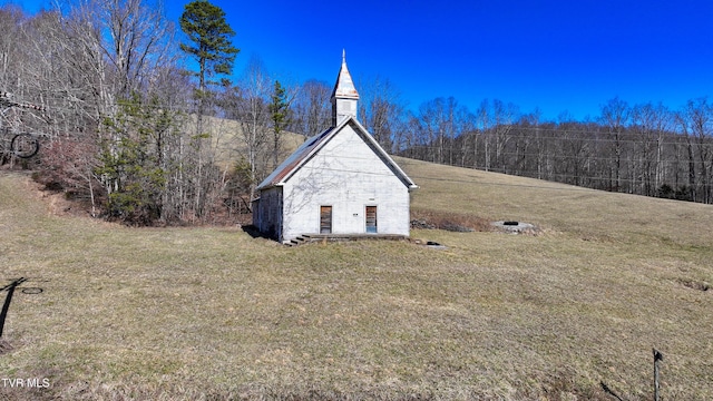 view of outbuilding featuring an outdoor structure