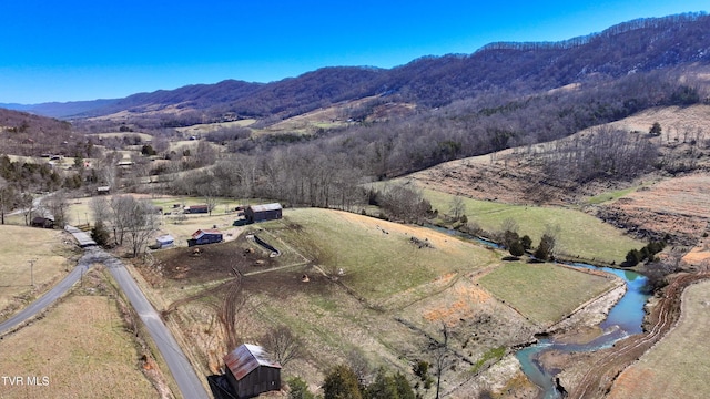 drone / aerial view featuring a mountain view