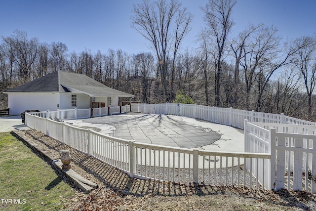 view of pool with a fenced in pool, fence, and a patio area