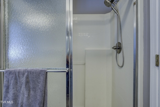 full bathroom with a stall shower