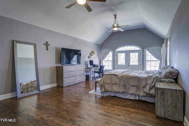 bedroom with vaulted ceiling, ceiling fan, baseboards, and wood finished floors