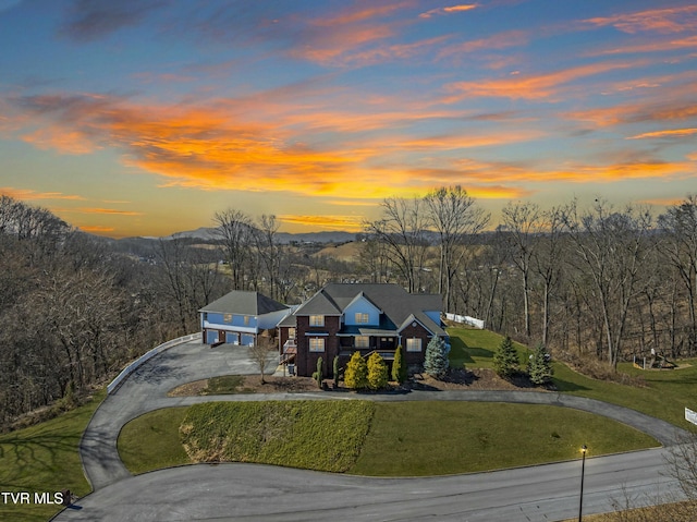 bird's eye view featuring a forest view