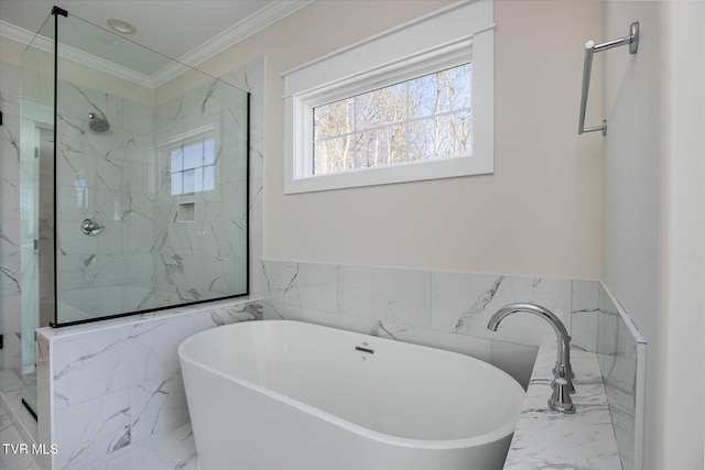 full bath featuring marble finish floor, crown molding, tile walls, a marble finish shower, and a soaking tub