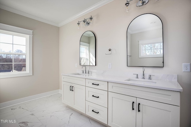 bathroom with marble finish floor, ornamental molding, and a sink