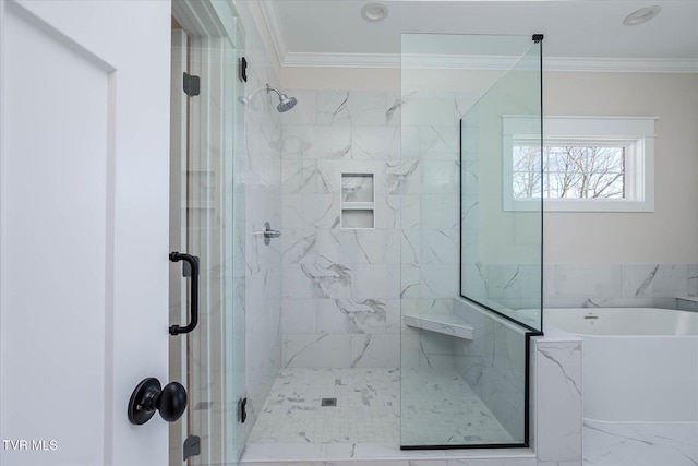 bathroom with a shower stall, ornamental molding, and a bath